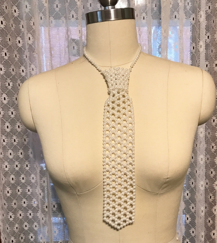 a handmade woven pearl necktie necklace